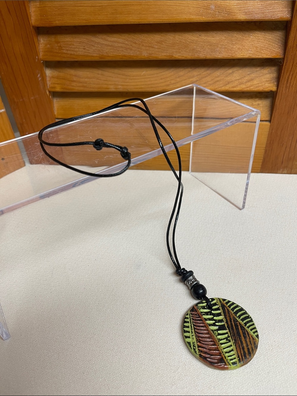 Handcrafted Black Cord Necklace with Green & Brown Leaf Pendant